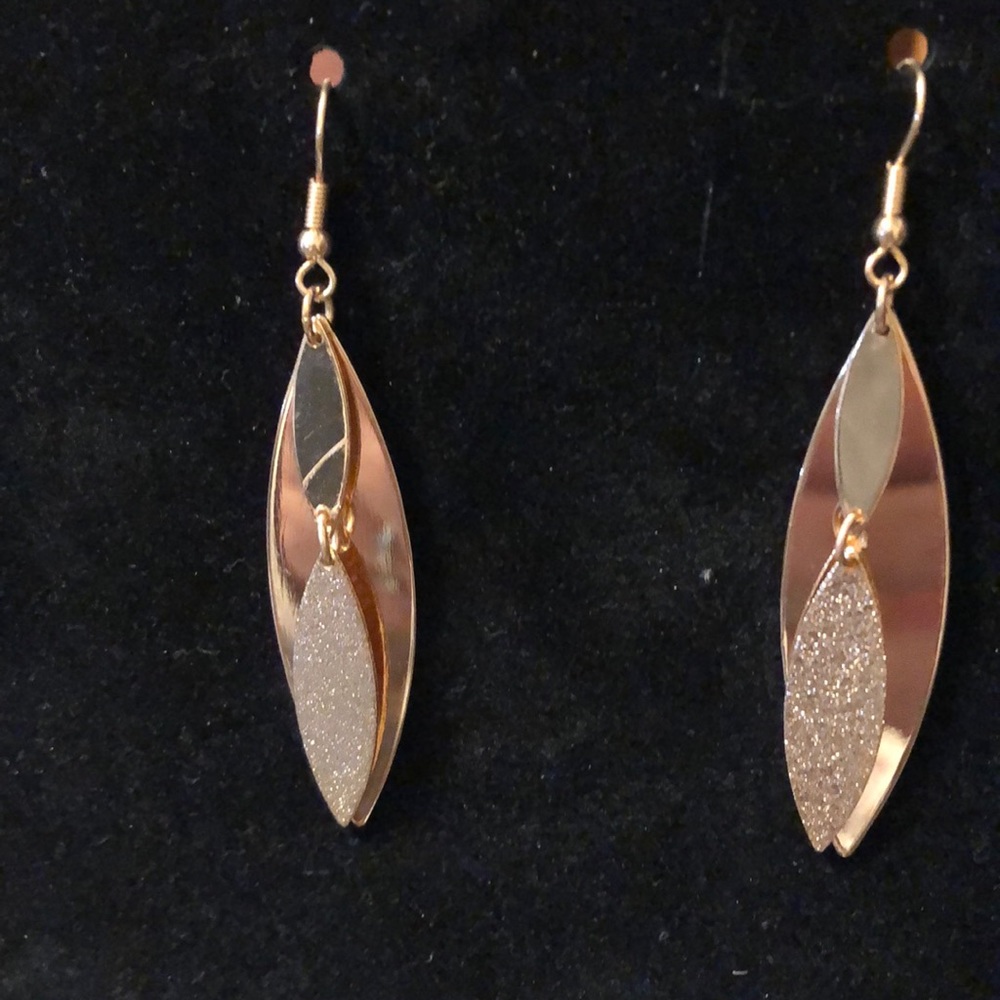Gold earrings, pierced